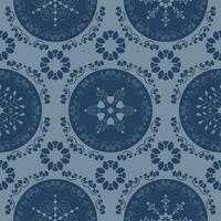 Seamless pattern christmas theme. Pretty mandalas and Frieze around with angels. Snowflakes, hearts and spirals. Color blue. vector