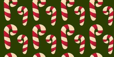 New Year seamless pattern. New Year's texture. Christmas candy cane on a green background. Vector illustration. Christmas sweets