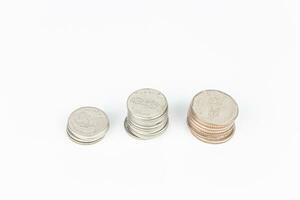 Coins isolated on white background with clipping path and copy space. photo