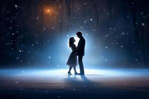 Silhouette of a loving couple in the winter forest at night photo