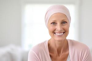 Portrait of beautiful mature woman with cancer awareness ribbon on her head photo