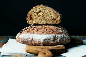 Freshly baked bread with a golden crust close up photo