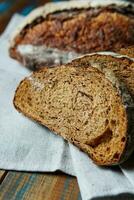 Freshly baked bread with a golden crust close up photo