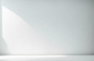 Empty white wall with beautiful chiaroscuro. Elegant minimalist background for product presentation photo