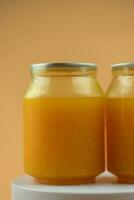 Cup bottle of fresh orange juice photo