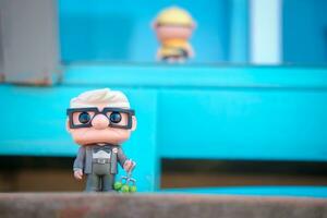 Bangkok, Thailand - October 12, 2023 Funko Pop action figures. Funko Pop Disney Russell nomber 60 and Carl nomber 59 photo