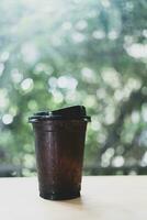 A cup of iced black coffee photo