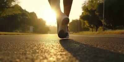 cerca arriba en el zapato, corredor atleta pies corriendo en el la carretera debajo luz de sol en el Mañana. ai generativo foto