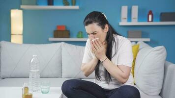 Woman covering her mouth and nose while coughing. video