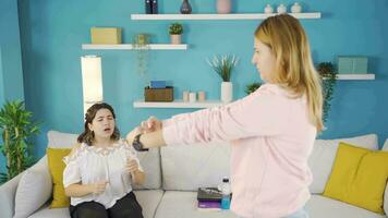 Friends play charades together at home. video