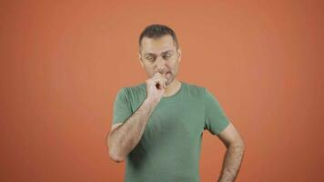 Stressed businessman biting nails. video