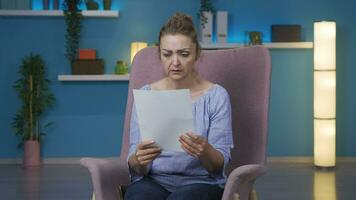 The woman who frets over abusive paperwork. video