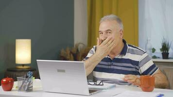 Home office worker man looking at camera with excitement and feeling happy. video