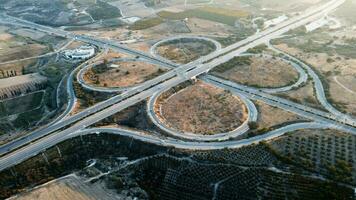 Top view to the cars driving on multilevel highway on the sunset. Mersin. O51 video