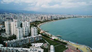 View from a drone of the coastal city of Mersin at sunset. Turkey. 4K. video