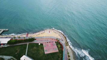 View from a drone of the coastal city of Mersin at sunset. Turkey. 4K. video