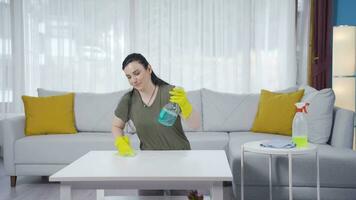 The woman who wipes the coffee table. video