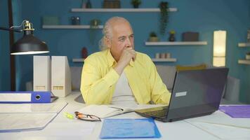 Home office worker man thinking creatively. video