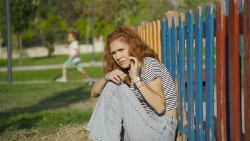 Young woman looking at camera with scared expression. video