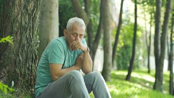 The man is looking at the camera with a frightened expression. video