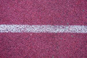 Running track with white line texture,sports texture for background photo