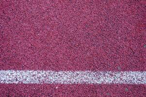 Running track with white line texture,sports texture for background photo