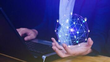 Businessman hand touching global infrastructure network on virtual screen working with client base online and customer connection data exchange. photo