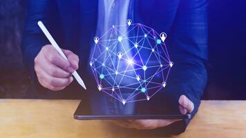 Businessman hand touching global infrastructure network on virtual screen working with client base online and customer connection data exchange. photo
