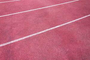 Running track sports texture for background photo