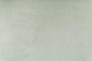 Texture of gray fabric diagonal weave pattern. Decorative textile background photo