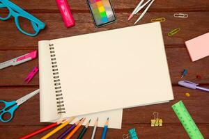 School supplies with middle space for text . photo