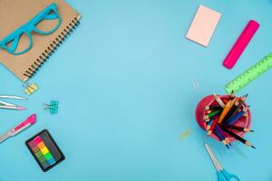 School supplies with middle space for text . photo