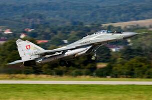 Military fighter jet plane at air base. Air force flight operation. Aviation and aircraft. Air defense. Military industry. Fly and flying. photo