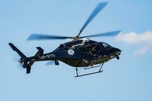 Government police helicopter at airport. Aviation and aircraft. Commercial and general aviation. Aviation industry. Fly and flying. photo