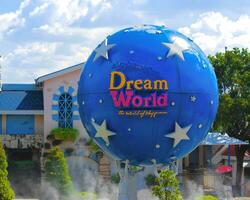PATHUMTHANI, THAILAND - OCTOBER 14, 2023 Dream globe, large Dream World logo Dream World is one of the most famous amusement parks in Pathum Thani, Thailand photo