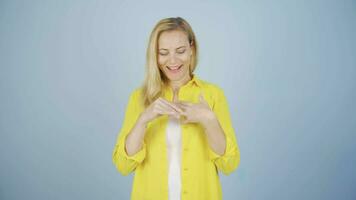 Happy and cheerful married woman showing her ring to the camera. video