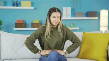 Young girl with stomachache. video