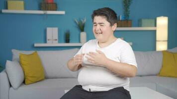 Obesity boy crying emotionally, depressed. video