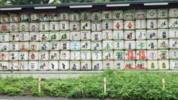 Tokyo , Japan - May 29 , 2023 Sake barrels at the Meiji Jingu Shrine in Shibuya, Tokyo, video