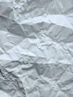 blanco arrugado textura papel o antecedentes foto