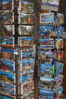 stand with colorful postcards in a souvenir shop on the Spanish island of Tenerife photo