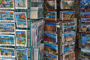 stand with colorful postcards in a souvenir shop on the Spanish island of Tenerife photo