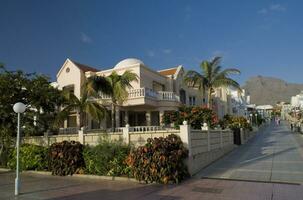 interesting tourist streets in the south of the Canary Island of Tenerife in Spain on a warm summer day photo