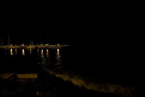 night landscape on the Spanish island of Tenerife with the ocean in the background photo