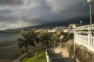 interesting tourist streets in the south of the Canary Island of Tenerife in Spain on a warm summer day photo