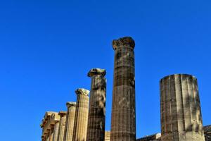 old antique stone ruins on a hot summer day on the Greek island of Rhodes in Lindos photo