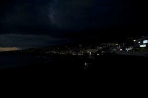 night landscape on the Spanish island of Tenerife with the ocean in the background photo