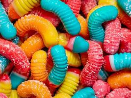 close up sweet colorful candies background photo