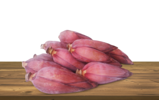 Banana blossom on a wooden table, isolated  PNG transparent