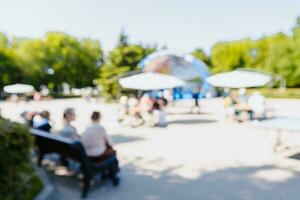 blurred park background, bright sun in the afternoon photo